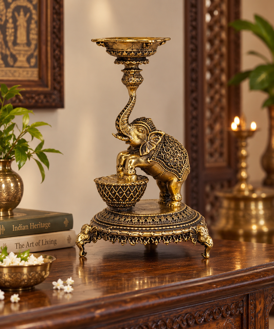 Antique brass elephant diya stand, traditional handcrafted brass pooja item with intricate detailing for religious ceremonies.
