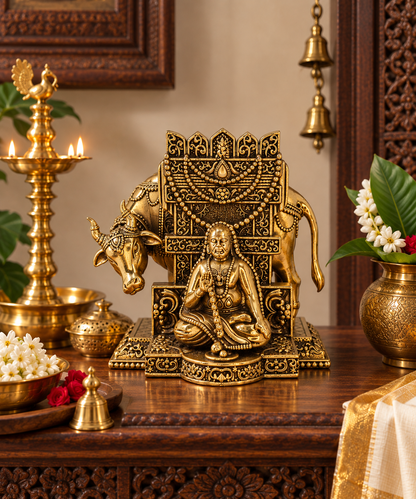 Brass Saint Raghavendra Swamy idol for South Indian decor, traditional brass pooja item with intricate detailing.