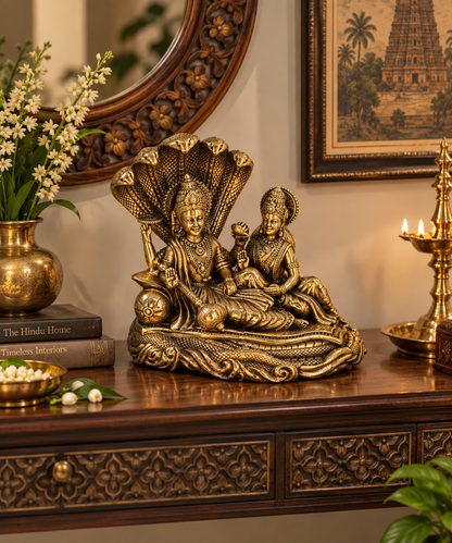 Antique brass Vishnu and Lakshmi on Sheshnag idol, a divine couple figurine for pooja, from The Gharnish brass pooja items collection.