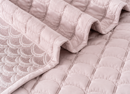 Luxury bedding set featuring serene wave stitch patterns, includes five pieces from The Gharnish for a stylish bedroom upgrade.