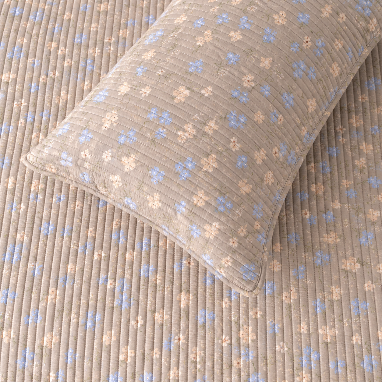 Soft floral bedding set of 3 pieces from The Gharnish, includes quilted bedcover and two matching pillow covers.