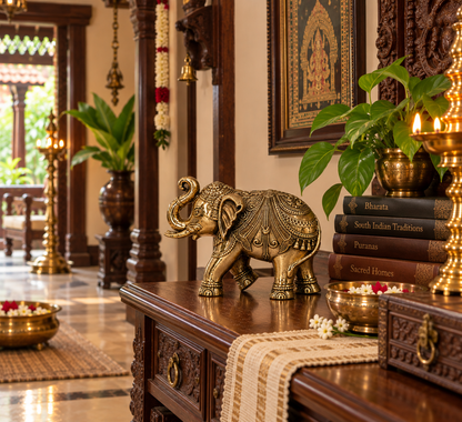 Solid brass elephant statue, traditional South Indian heritage décor, ideal for pooja or home decorative accents.