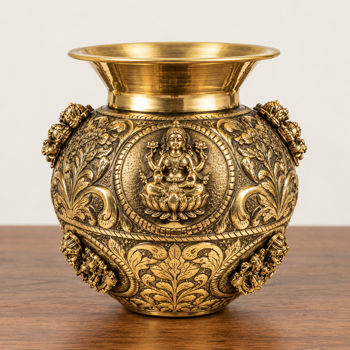 Antique handcrafted Ashtalakshmi brass kalash for pooja, showcasing intricate traditional design and polished brass finish.