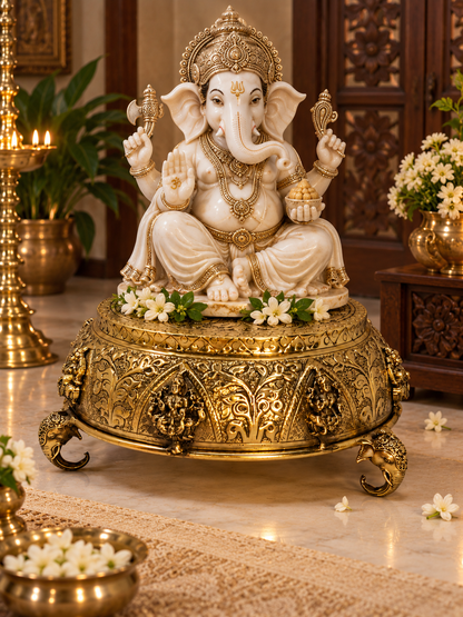 Elegant brass Astalakshmi carved chowki from The Gharnish, ornate puja pedestal and decorative brass puja item.