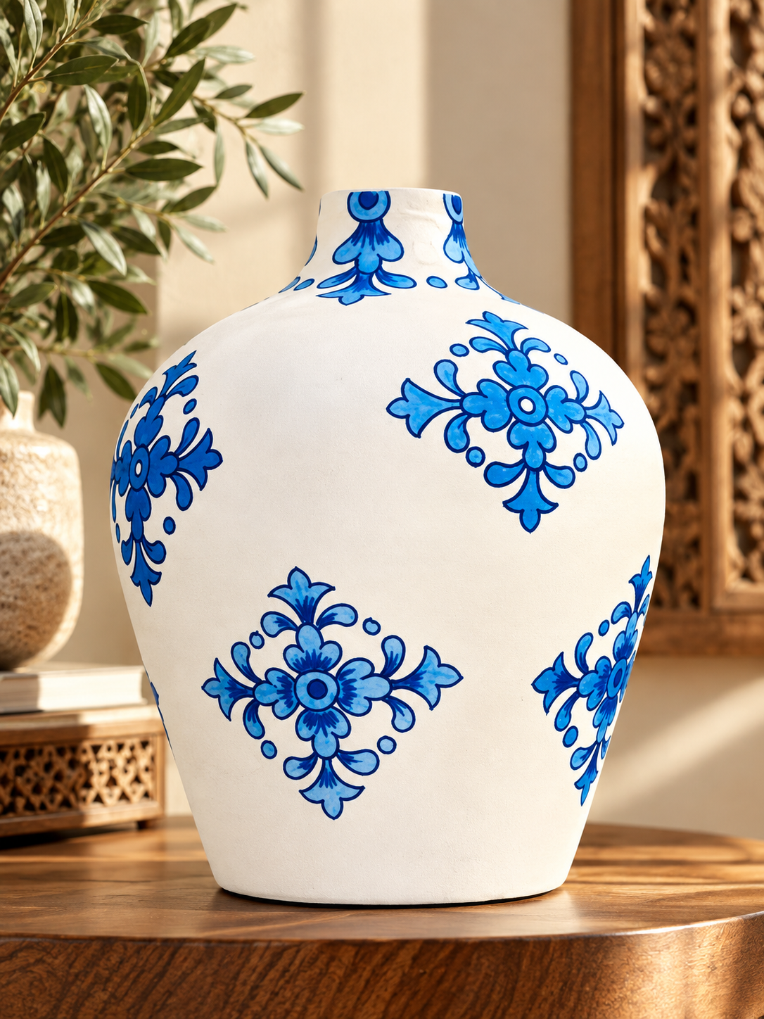 Oversized hand-painted ceramic blue pottery vase by The Gharnish, featuring intricate blue and white decorative patterns.
