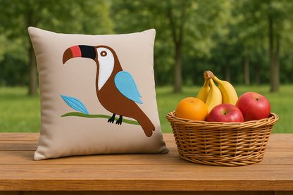 Decorative pillow with a toucan design on a wooden table with a basket of fruits.