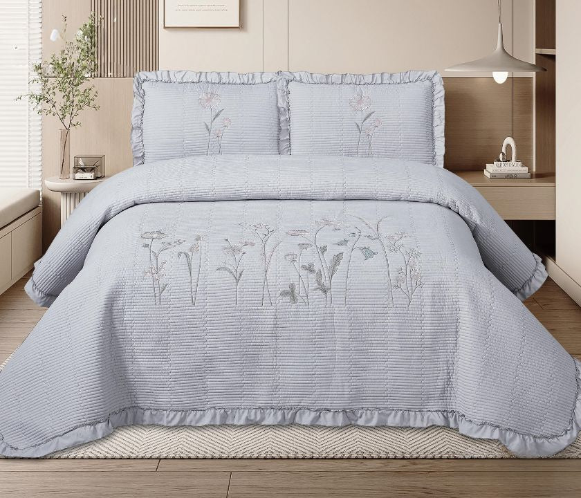 Florina 3-piece embroidered premium bedding set by The Gharnish with intricate floral embroidery on soft fabric.