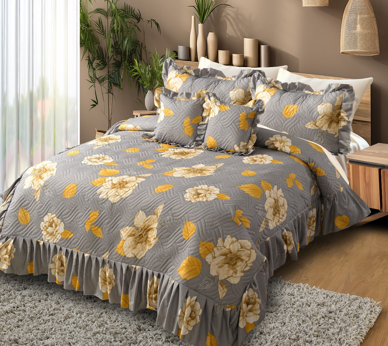 Floral patterned comforter set on a bed in a bedroom setting
