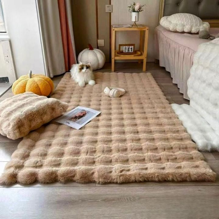 Beige plush rabbit fur area rug from The Gharnish, soft and fluffy Cloud Luxe Fur Carpet for cozy home decor.