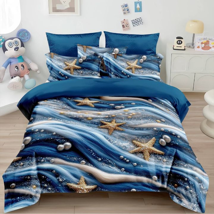 Blue ocean-themed bedding set with starfish and waves in a bedroom.