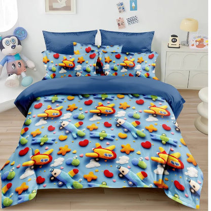 Children's bedding set with airplane and star patterns on a bed in a room.