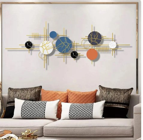 Modern Circle Aerial Wall Art is a contemporary design concept that typically features circular or spherical shapes arranged in an abstract, aerial view style. These pieces often use metal, wood, or other materials to create a dynamic, three-dimensional effect on the wall. The circles can vary in size, texture, and color, creating a visually engaging composition that draws the eye and adds depth to the space.

Product Details :-
Product Size is 48x18 Inches
Made of Iron and Powder Coating 
