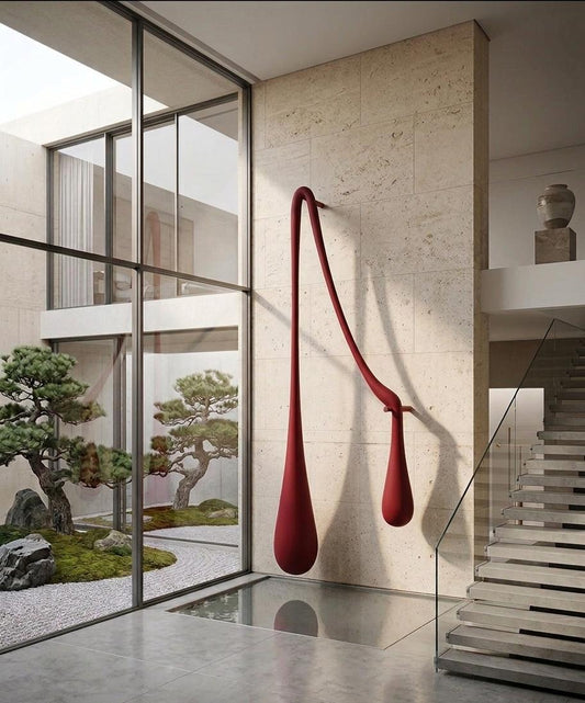 Modern abstract resin wall sculpture by The Gharnish, featuring sleek, flowing design for contemporary interior decor.
