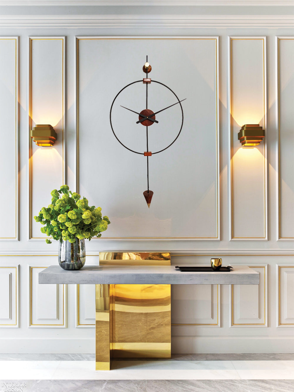 Large wooden wall clock by The Gharnish, modern and luxurious, hanging on a stylish Manhattan mansion interior wall.