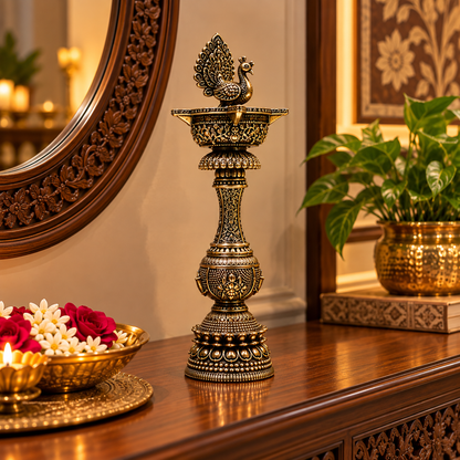 Antique brass peacock diya stand with intricate design, traditional handcrafted decorative oil lamp for puja and home decor.