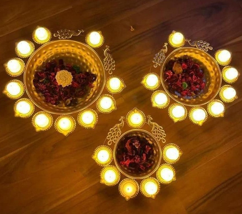 This Diwali decorate your home with a set of 5 peacock urli set 