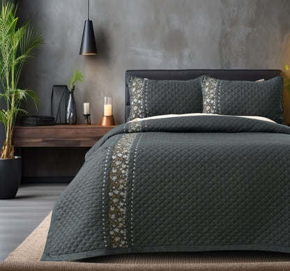 Blush Blossom quilted bedding set by The Gharnish featuring a soft, floral pattern on a cozy bed.
