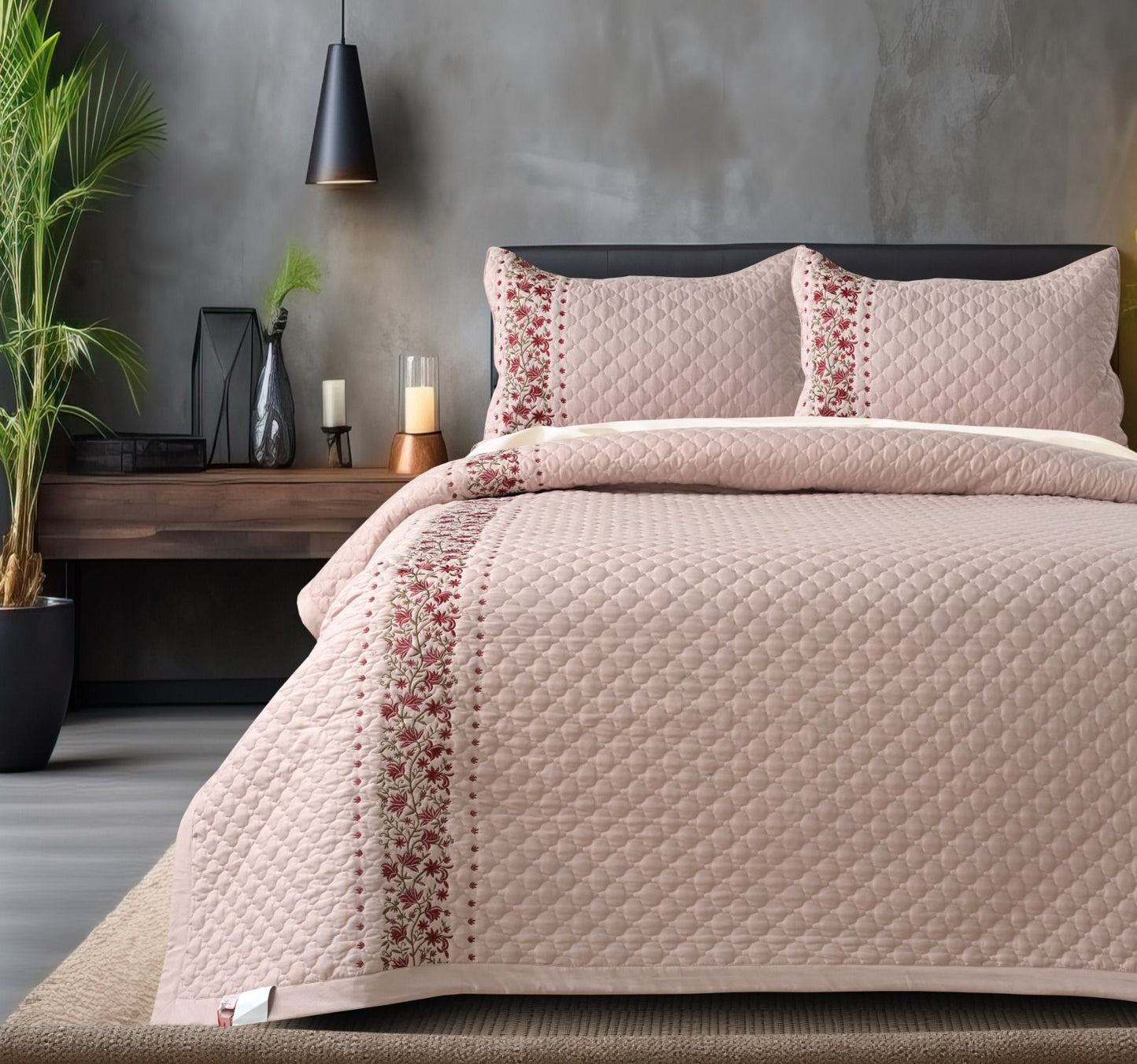 Blush Blossom quilted bedcover set with floral pattern, soft bedding from The Gharnish for a cozy bedroom decor.