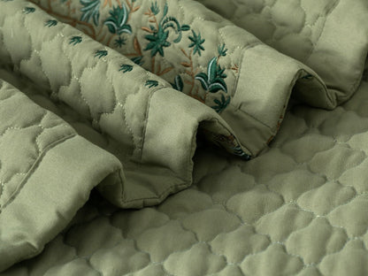 Blush Blossom quilted bedcover set from The Gharnish, featuring floral embroidery and cozy bedding for a stylish bedroom look.