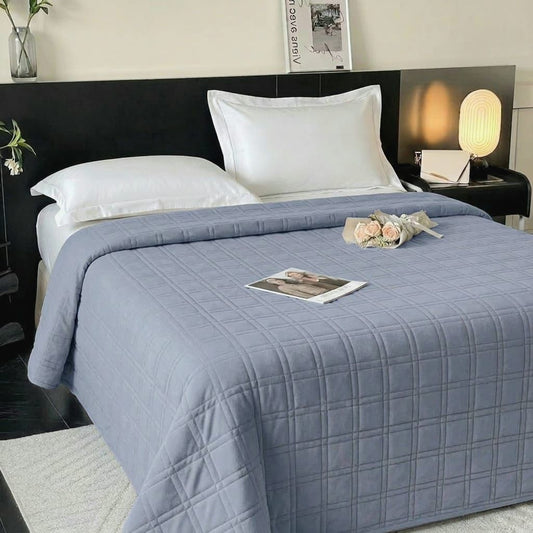 Luxury designer double bed ac comforter by The Gharnish, soft fabric with elegant stitching, perfect for a cozy bedroom.