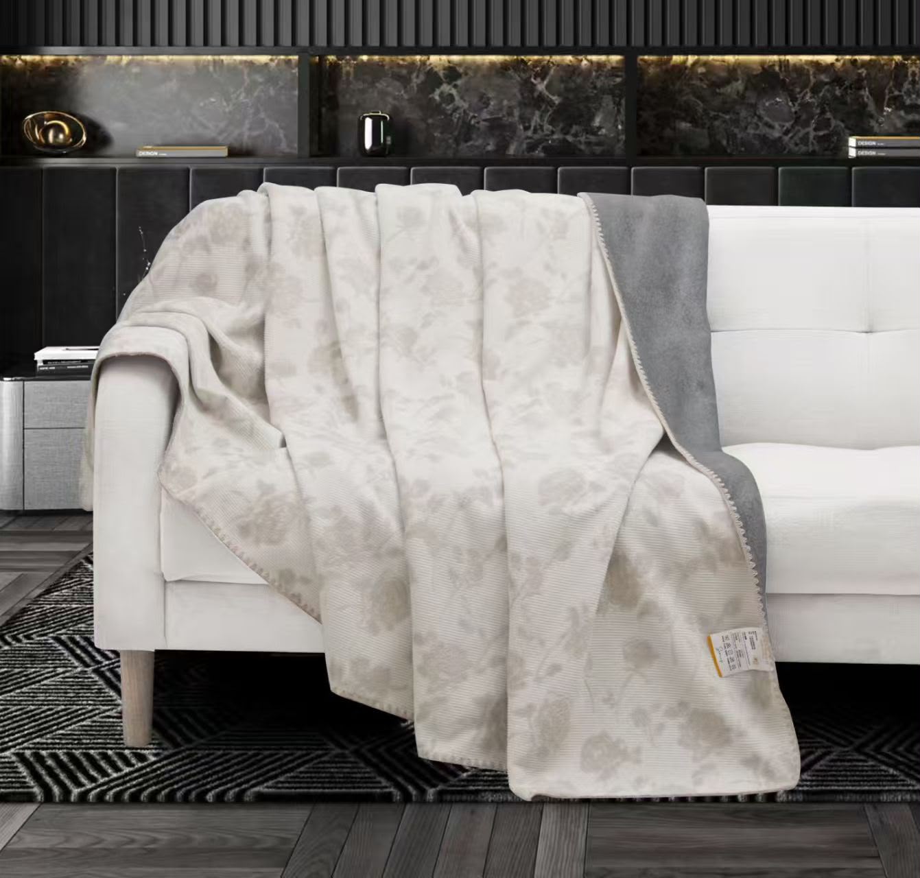 Lightweight The Gharnish Premium AC Blanket in soft fabric, shown folded with a smooth surface and subtle texture.