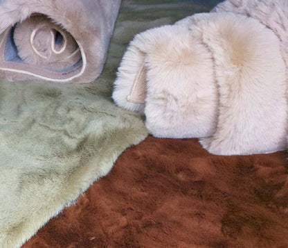 This Carpet made from high-quality faux rabbit fur, which offers an incredibly soft and plush texture. This material mimics the feel of real rabbit fur, providing a luxurious and cozy touch to your bedroom or any other area of your home.

