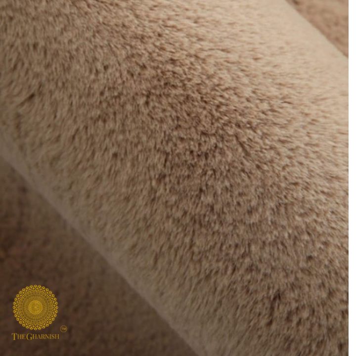 This Carpet made from high-quality faux rabbit fur, which offers an incredibly soft and plush texture. This material mimics the feel of real rabbit fur, providing a luxurious and cozy touch to your bedroom or any other area of your home.

