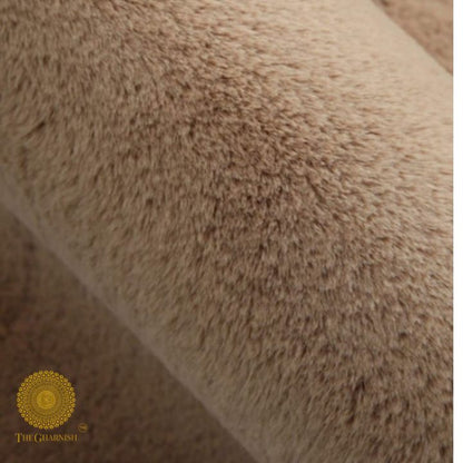 This Carpet made from high-quality faux rabbit fur, which offers an incredibly soft and plush texture. This material mimics the feel of real rabbit fur, providing a luxurious and cozy touch to your bedroom or any other area of your home.

