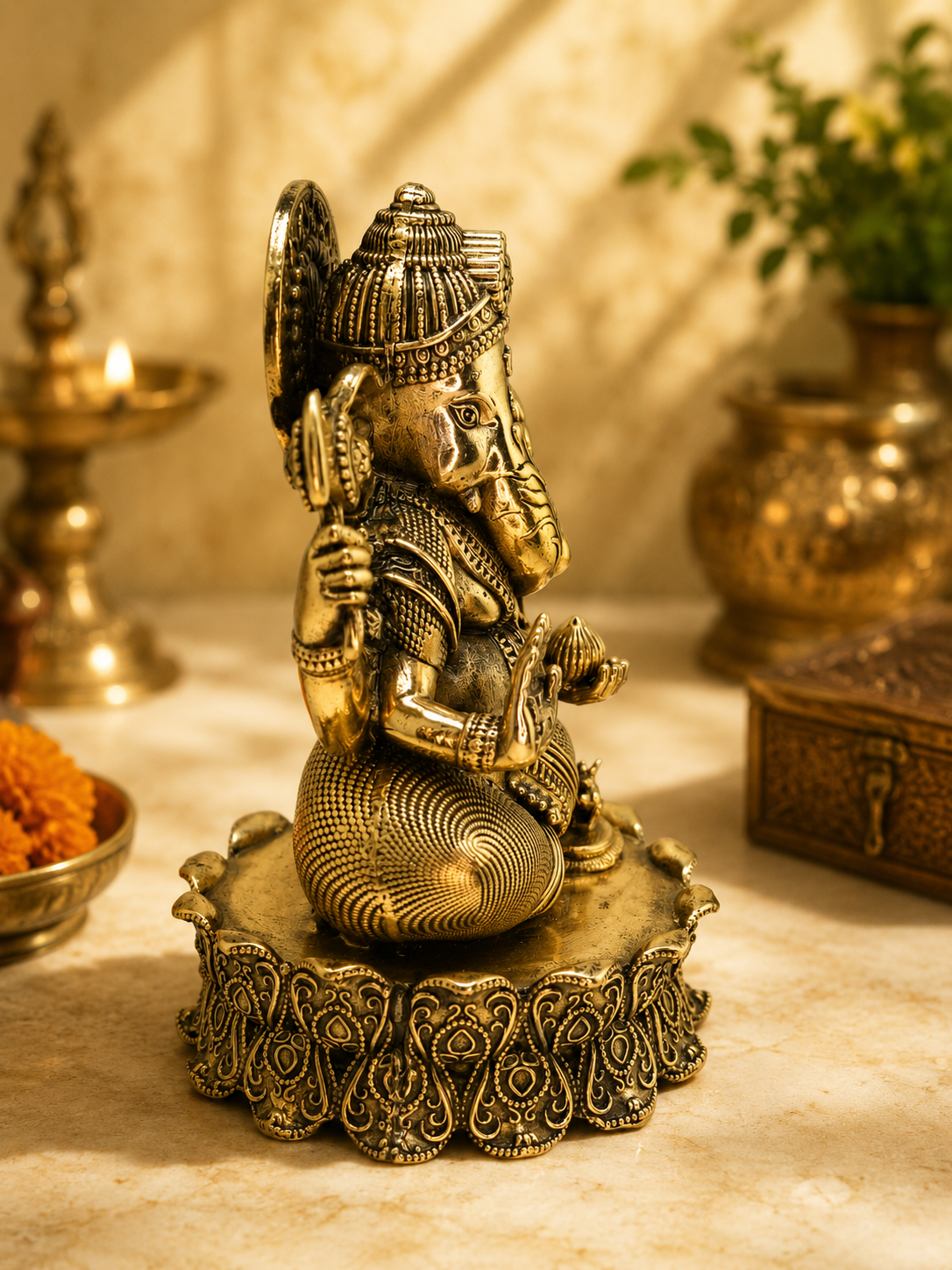 Handcrafted brass Ganesha Murti for home puja, featuring intricate details on a brass Ganesha idol for prayer and decoration.