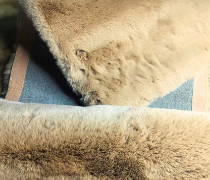 This Carpet made from high-quality faux rabbit fur, which offers an incredibly soft and plush texture. This material mimics the feel of real rabbit fur, providing a luxurious and cozy touch to your bedroom or any other area of your home.

