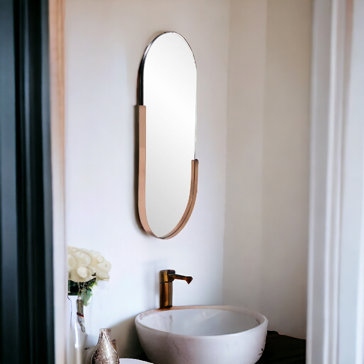 Obsidian Arch Statement Mirror by The Gharnish, a stylish wall mirror with a sleek black frame and arch design.