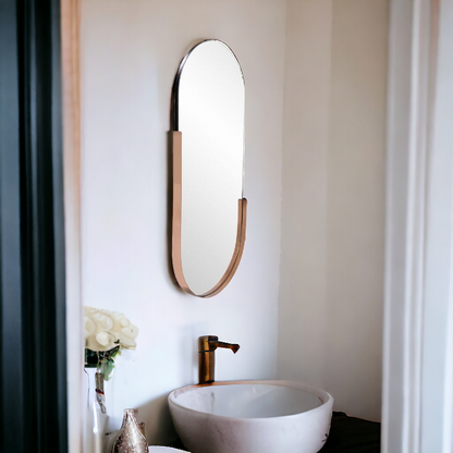 Obsidian Arch Statement Mirror by The Gharnish, a stylish wall mirror with a sleek black frame and arch design.