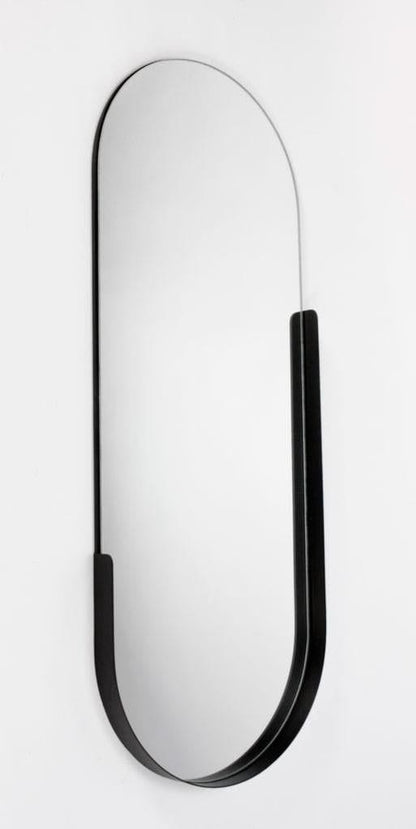 Obsidian Arch Statement Wall Mirror by The Gharnish with a sleek, curved black frame and reflective glass.