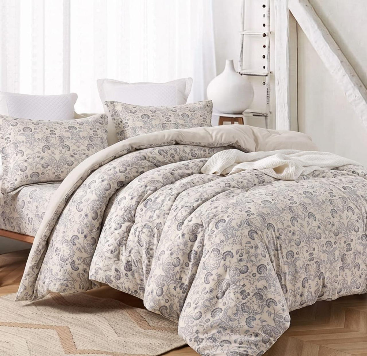 Paisley-patterned reversible comforter set by The Gharnish, king size bedding with intricate design and cozy fabric.