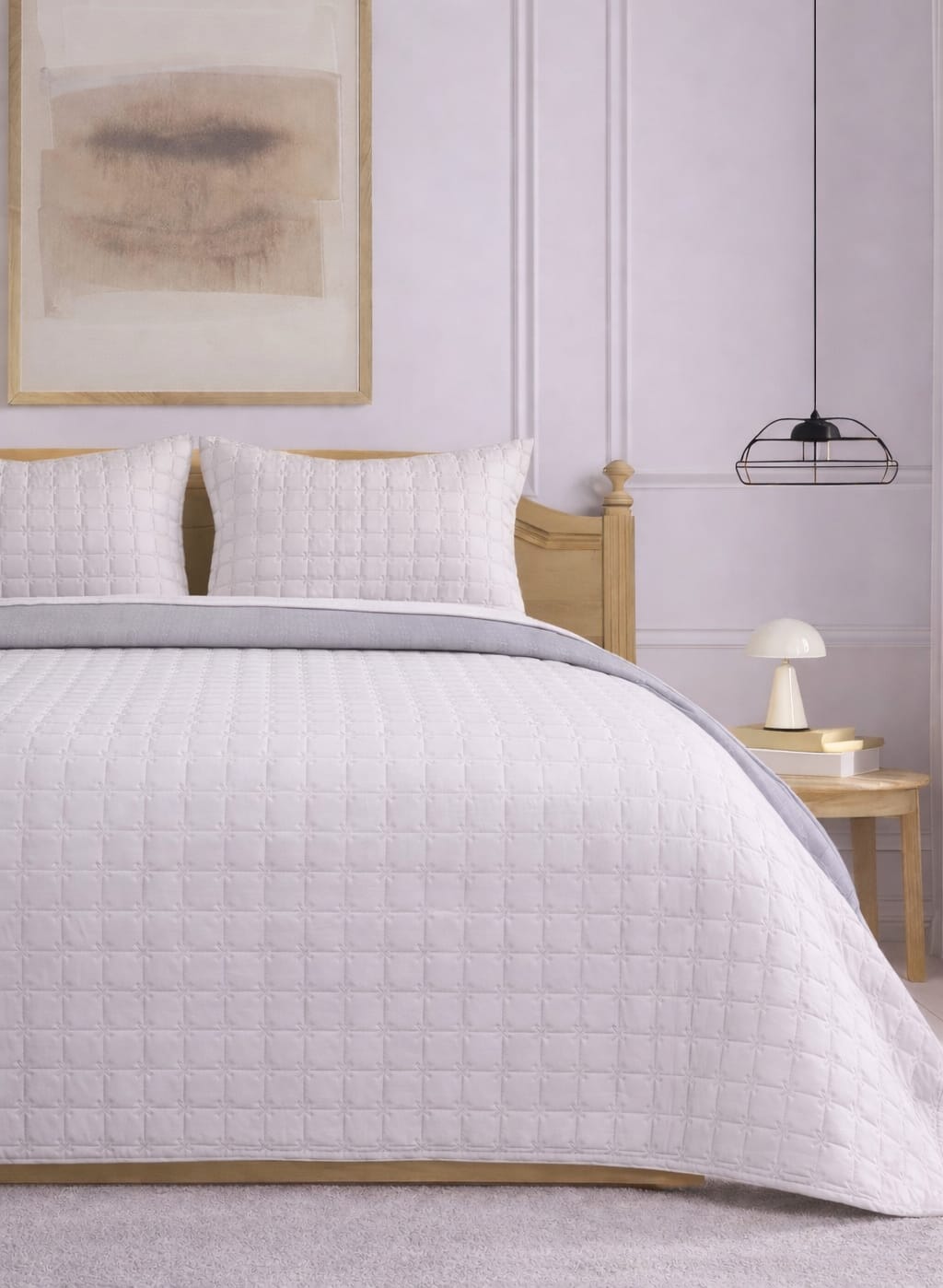 Soft and snug luxury 3-piece quilted bedding set by The Gharnish with pastel reversible bedspread in calming shades.