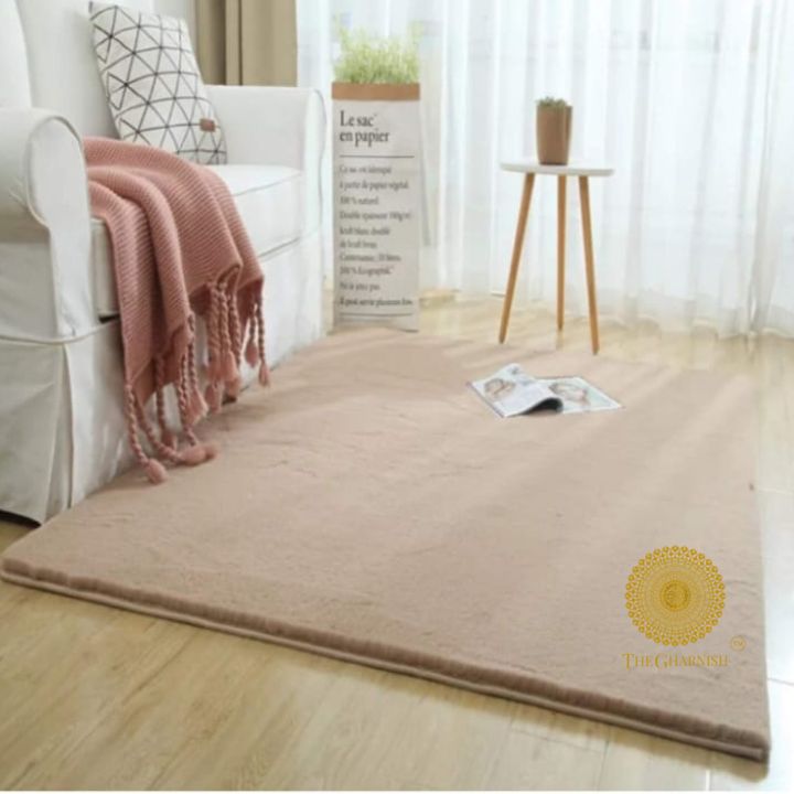 This Carpet made from high-quality faux rabbit fur, which offers an incredibly soft and plush texture. This material mimics the feel of real rabbit fur, providing a luxurious and cozy touch to your bedroom or any other area of your home.

