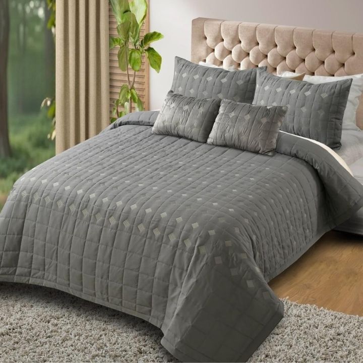 Elegant Persian embroidered quilted bedding set by the brand, featuring intricate embroidery and a luxurious 5-piece design.