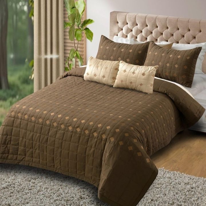 Elegant Persian embroidered quilted bed set by the bedding brand, featuring detailed embroidery and plush comfort in a 5-piece design.