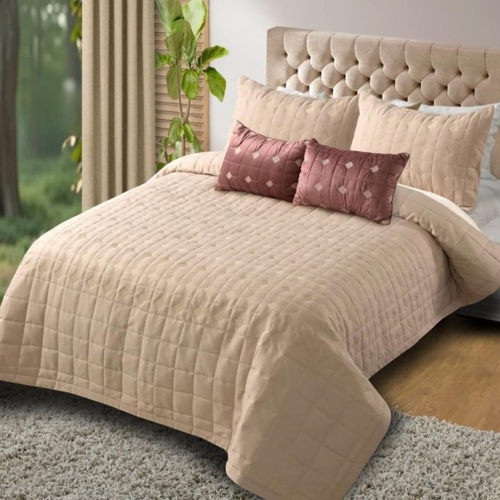 Elegant Persian embroidered quilted bedding set by The, 5-piece premium bedding with intricate embroidery and plush quilting design.
