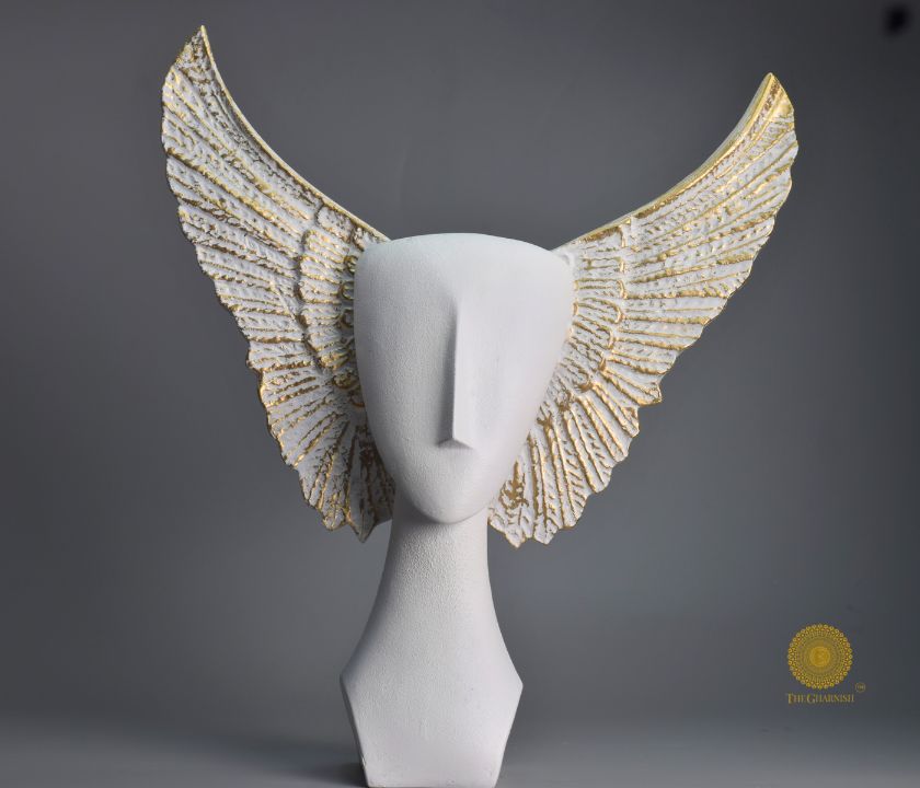 Black Flying Face Statue by The Gharnish, an abstract figurine with a modern, artistic face design on a sleek base.