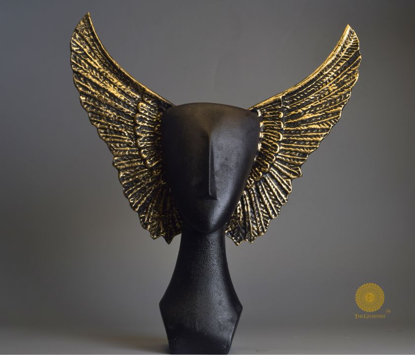 Black abstract flying face statue by The Gharnish, a unique figurine with modern design and artistic expression.