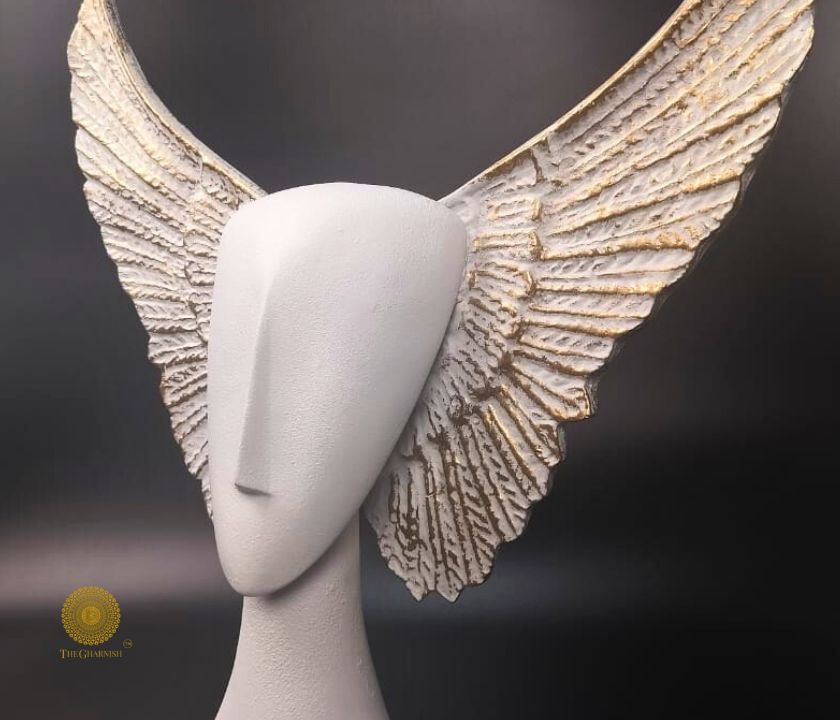Black Flying Face Statue by The Gharnish, abstract figurine sculpture with a modern, artistic design.