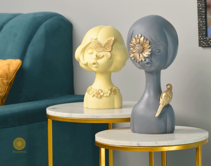 Set of 2 Springtime Girls abstract figurines by The Gharnish, pink and grey decorative statues representing playful girl figures.