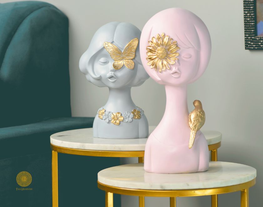 Set of 2 Springtime Girls abstract figurines by The Gharnish, pink and grey decorative statues representing playful girl sculptures.