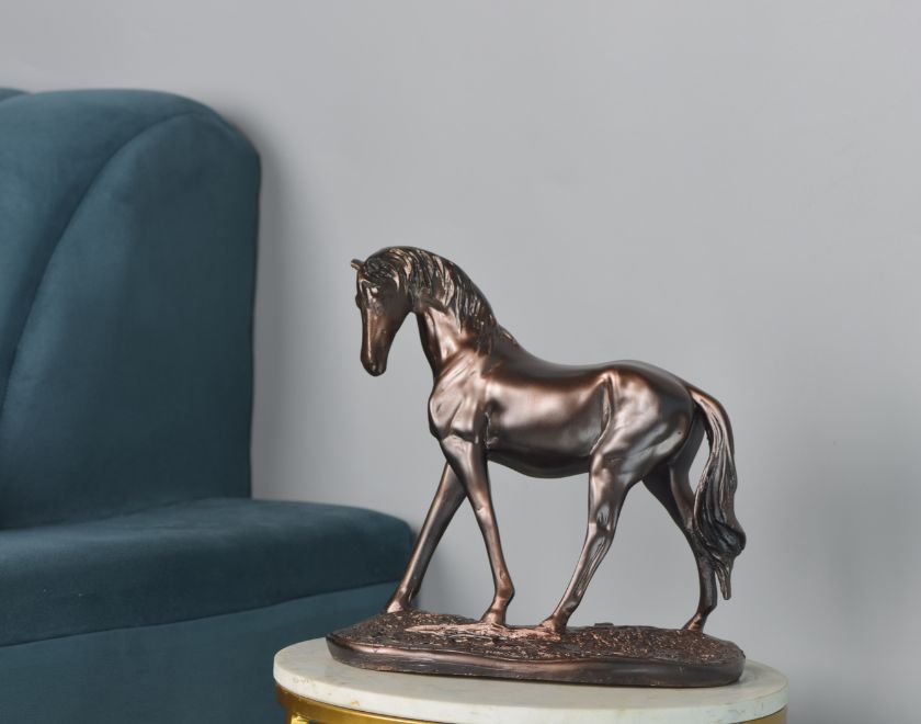 Metallic premium Polyesin horse statue by The Gharnish, a detailed animal figurine with a shiny finish.