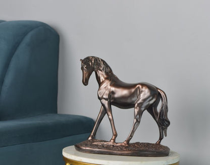 Metallic premium Polyesin horse statue by The Gharnish, a detailed animal figurine with a shiny finish.
