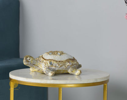 Gold tortoise animal figurine by The Gharnish, perfect as a Vastu showpiece, detailed animal sculpture for home decor.