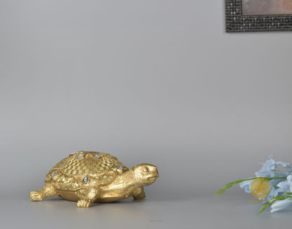 Gold tortoise showpiece from The Gharnish animal figurines collection, perfect for Vastu, crafted as a decorative Tortoise figurine.