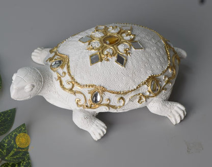Gold tortoise showpiece from The Gharnish animal figurines collection, ideal for Vastu and decorative display.