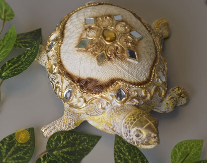 Gold tortoise showpiece from The Gharnish, Vastu animal figurine for decorative and spiritual home enhancement.